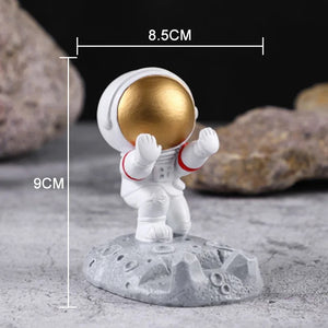 Figura de astronauta, soporte para celular o IPAD diseños y colores surtidos
