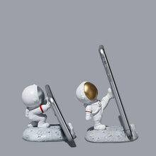 Figura de astronauta, soporte para celular o IPAD diseños y colores surtidos
